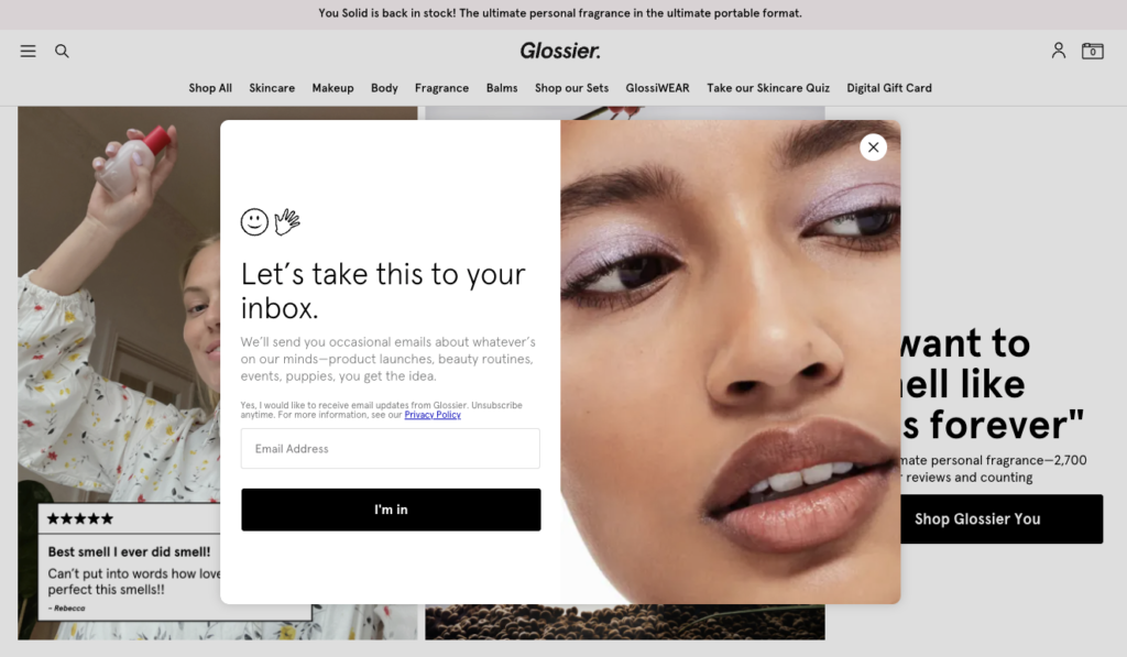 glossier ecommerce homepage popup